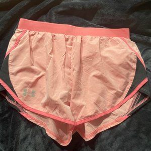 Pink Under Armour Running Shorts (size small)